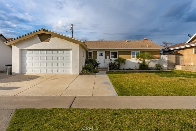 ranch-style home with stucco siding, an attached garage, concrete driveway, and a front lawn