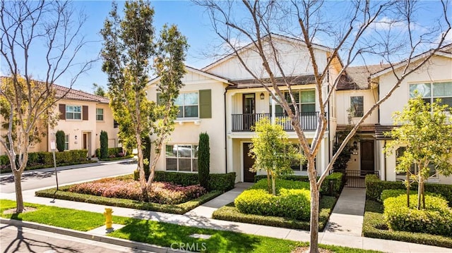 townhome / multi-family property with stucco siding