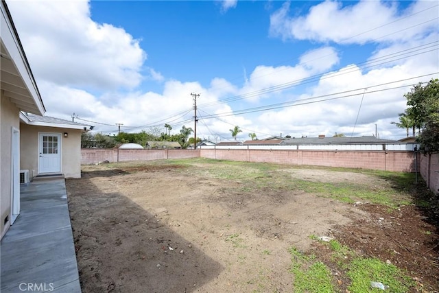 view of yard featuring a fenced backyard