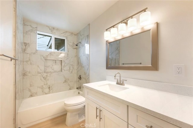 full bathroom with toilet, vanity,  shower combination, and wood finished floors