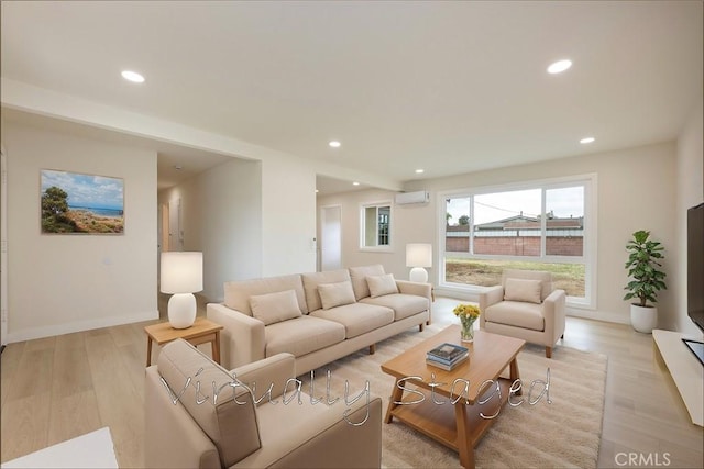 living room with a wall mounted air conditioner, recessed lighting, baseboards, and light wood finished floors