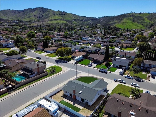 bird's eye view featuring a residential view and a mountain view