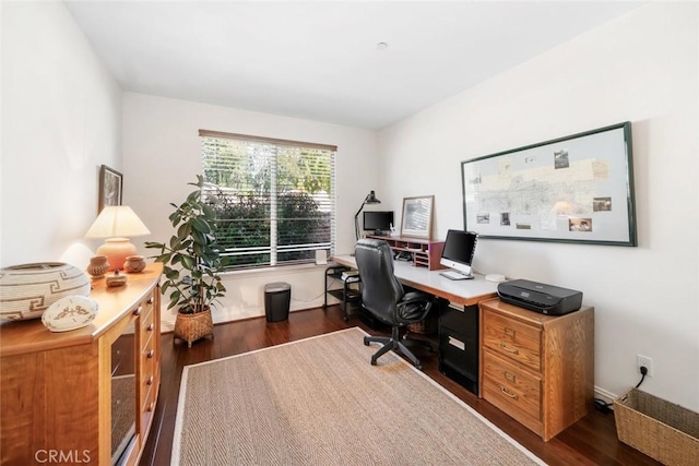 office space featuring baseboards and dark wood-style flooring