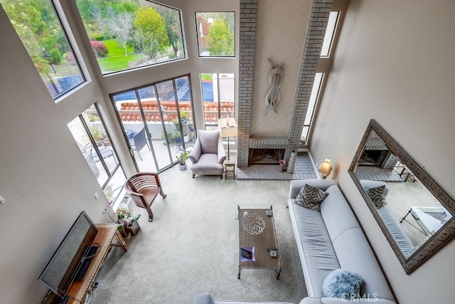 27578 Lene, Mission Viejo, CA 92692 - carpeted living room featuring a towering ceiling and a fireplace