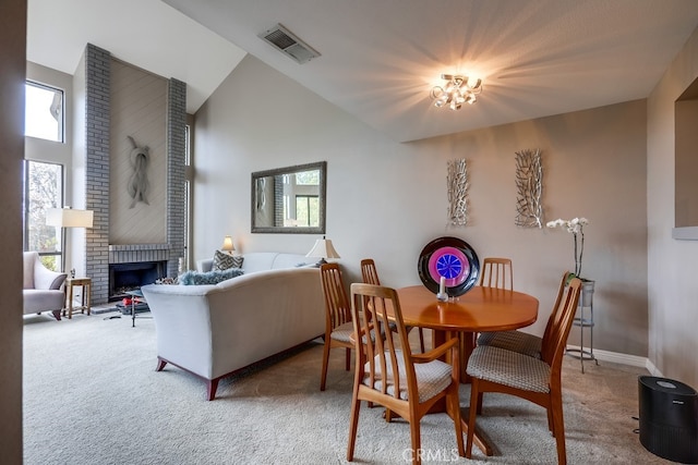 27578 Lene, Mission Viejo, CA 92692 - dining area featuring carpet, high vaulted ceiling, and a brick fireplace