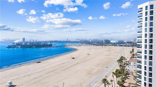 property view of water featuring a view of city and a beach view