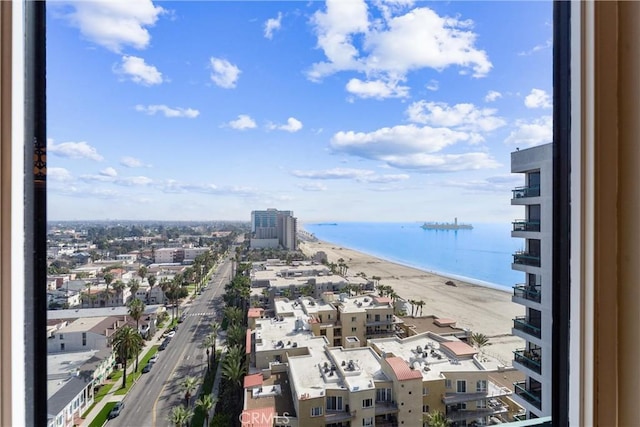 view of water feature with a view of city and a view of the beach