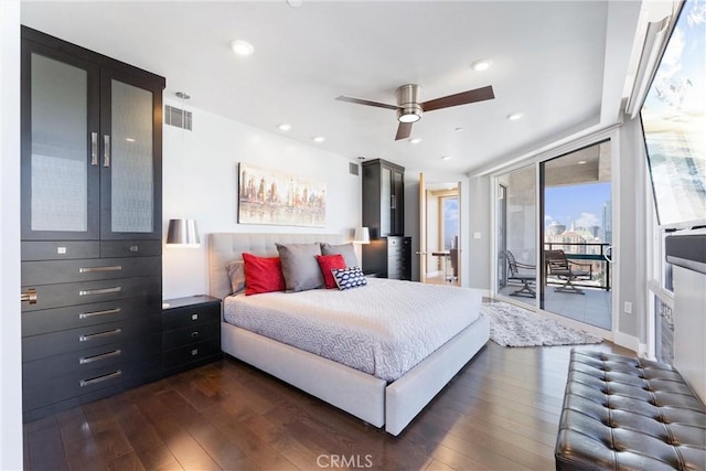 bedroom with visible vents, recessed lighting, dark wood-type flooring, and access to outside