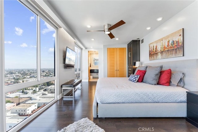 bedroom with visible vents, recessed lighting, baseboards, ceiling fan, and dark wood-style flooring