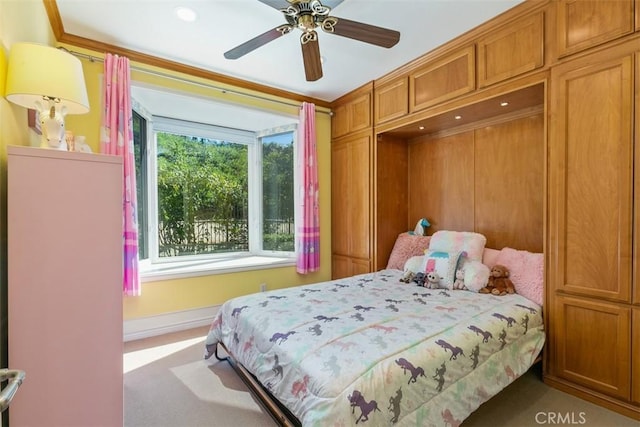 bedroom featuring baseboards and a ceiling fan