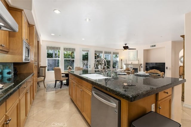 kitchen featuring visible vents, a healthy amount of sunlight, appliances with stainless steel finishes, and a sink