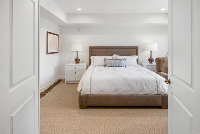 bedroom featuring recessed lighting and baseboards