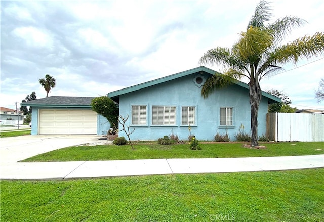 single story home featuring fence, a front yard, stucco siding, a garage, and driveway