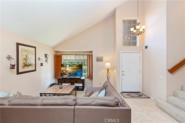 living room featuring stairway, visible vents, high vaulted ceiling, and a chandelier