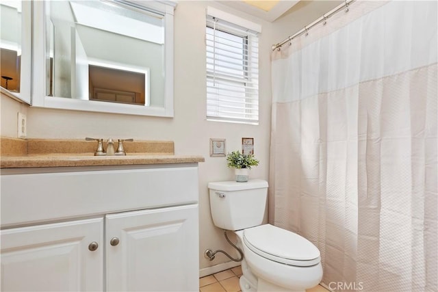 full bathroom with vanity, tile patterned floors, toilet, and a shower with curtain