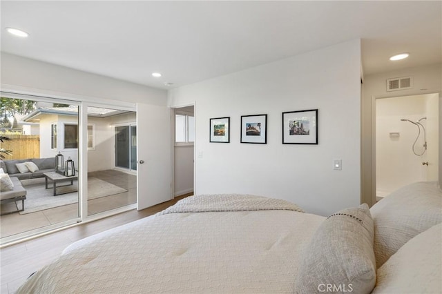 bedroom with visible vents, recessed lighting, and wood finished floors