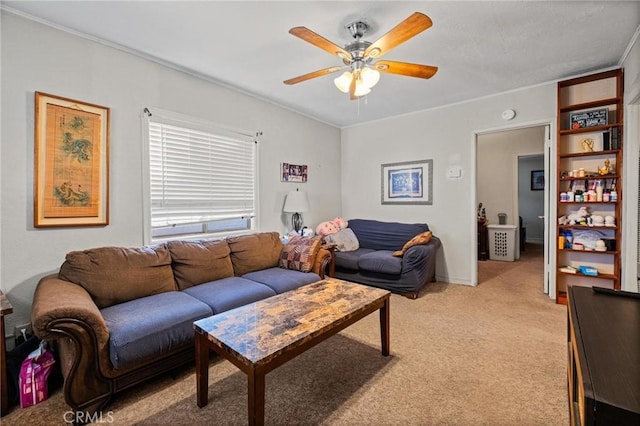 living room featuring a ceiling fan and light colored carpet