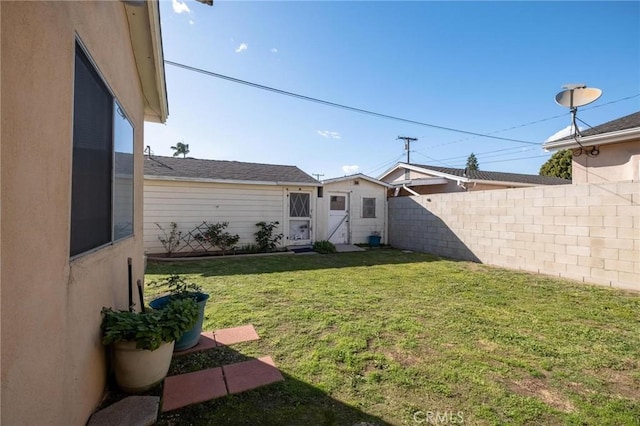 view of yard with fence