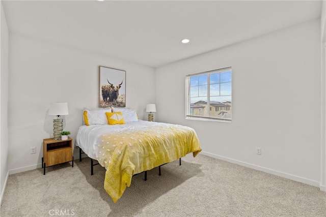 carpeted bedroom with recessed lighting and baseboards