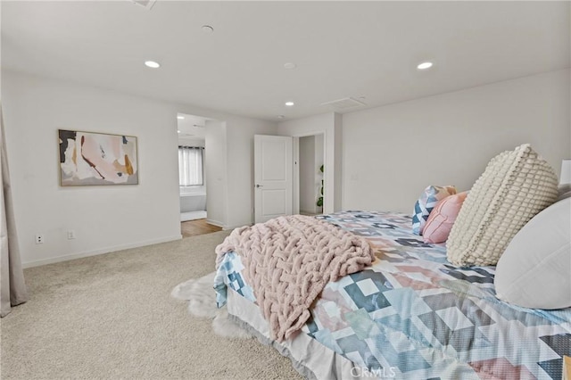 bedroom with recessed lighting, baseboards, and carpet floors