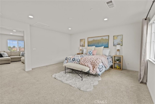 bedroom with recessed lighting, visible vents, baseboards, and carpet