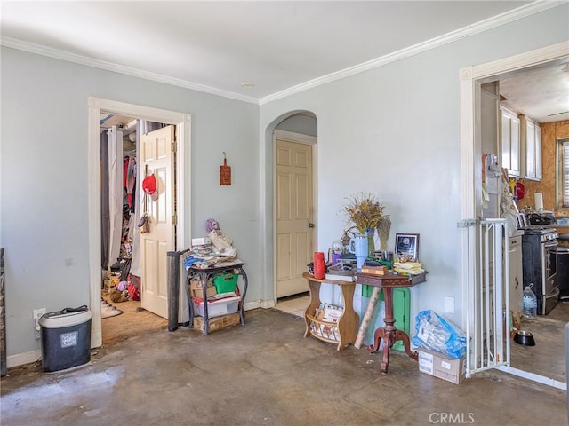 interior space with arched walkways, concrete floors, and crown molding