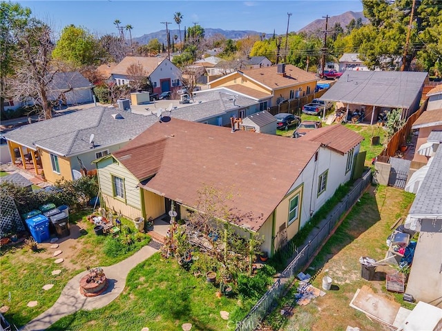 drone / aerial view with a mountain view and a residential view