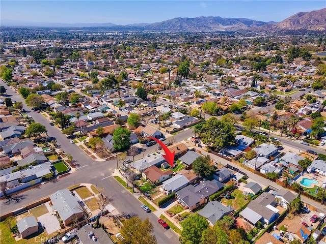 bird's eye view with a residential view and a mountain view