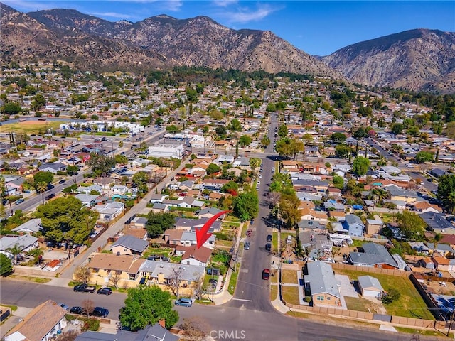 aerial view featuring a mountain view and a residential view