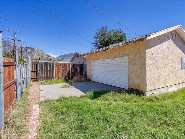 detached garage with fence