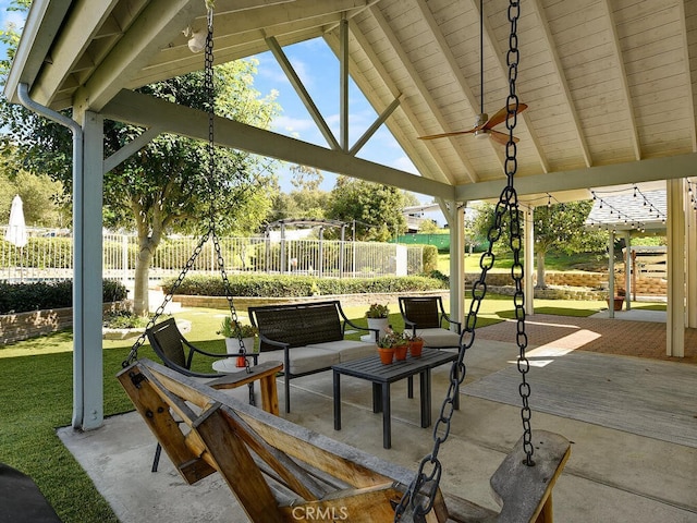 view of patio / terrace featuring fence, a gazebo, and ceiling fan