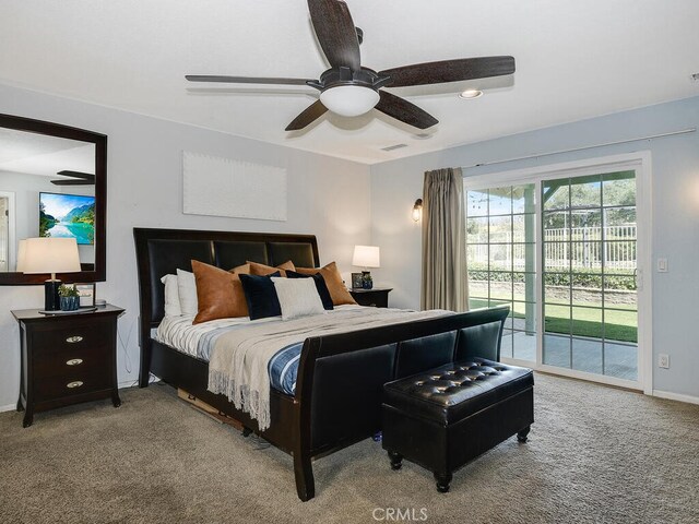 bedroom with carpet flooring, a ceiling fan, access to outside, and visible vents