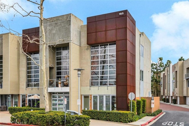 view of building exterior with cooling unit