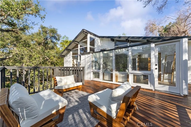 deck featuring a sunroom