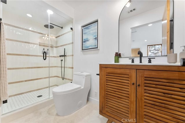 full bathroom featuring visible vents, vanity, toilet, and a shower stall