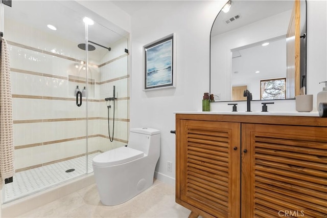 bathroom with visible vents, a shower stall, toilet, and vanity