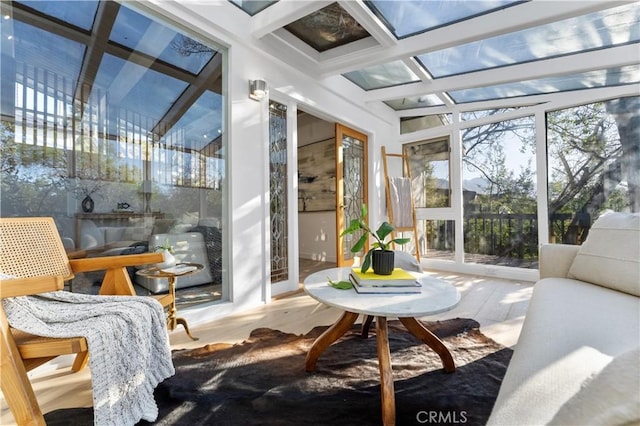 sunroom / solarium featuring beamed ceiling and coffered ceiling