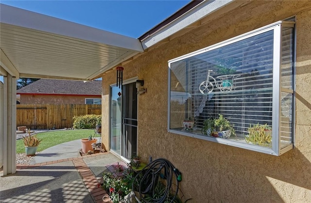 view of patio with fence