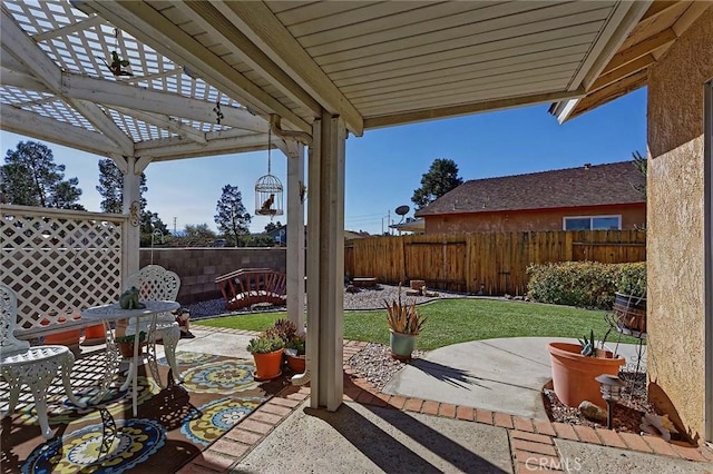 view of patio / terrace with a pergola and a fenced backyard