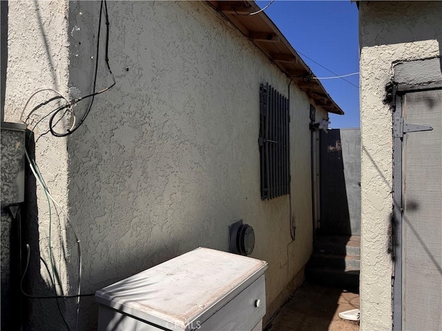 view of property exterior with stucco siding