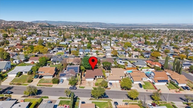 aerial view with a mountain view and a residential view