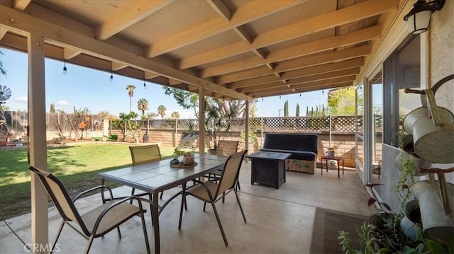 view of patio with outdoor dining area and a fenced backyard