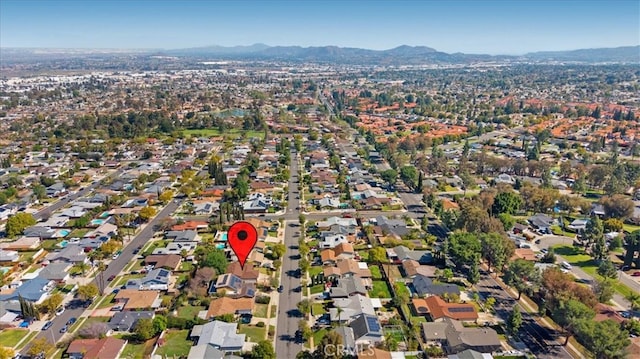 drone / aerial view featuring a mountain view and a residential view