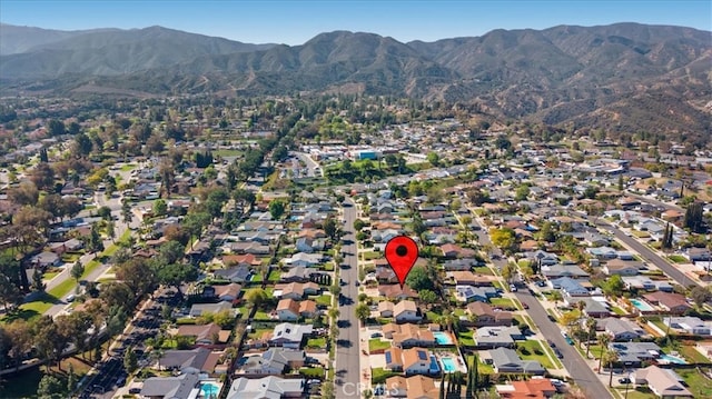 drone / aerial view with a mountain view and a residential view