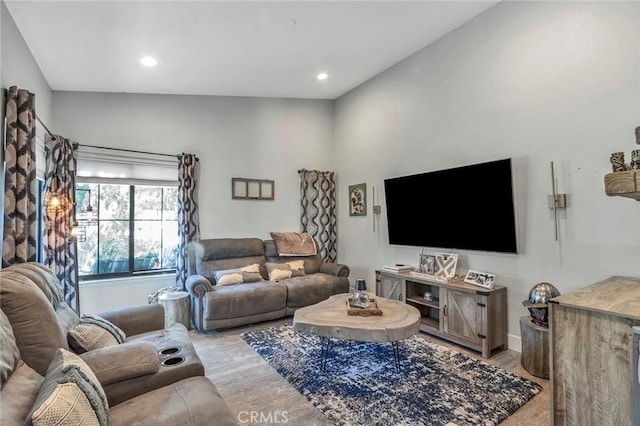 living area featuring recessed lighting and wood finished floors