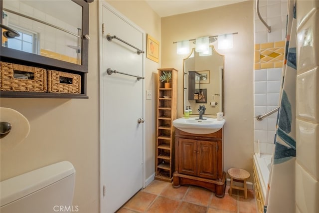 full bath featuring toilet, shower / tub combo with curtain, and vanity