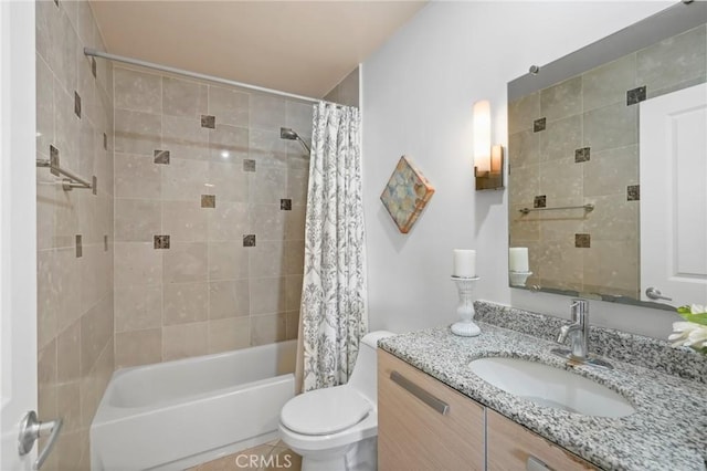 bathroom featuring vanity, toilet, and shower / tub combo with curtain