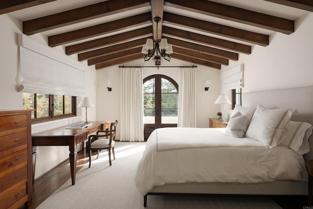 carpeted bedroom featuring access to exterior, lofted ceiling with beams, multiple windows, and french doors