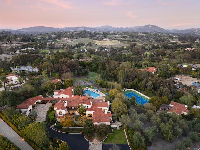 aerial view at dusk with a mountain view