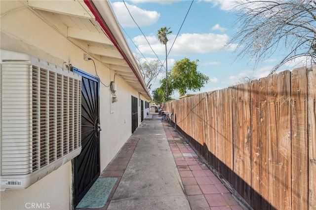 view of home's exterior featuring fence